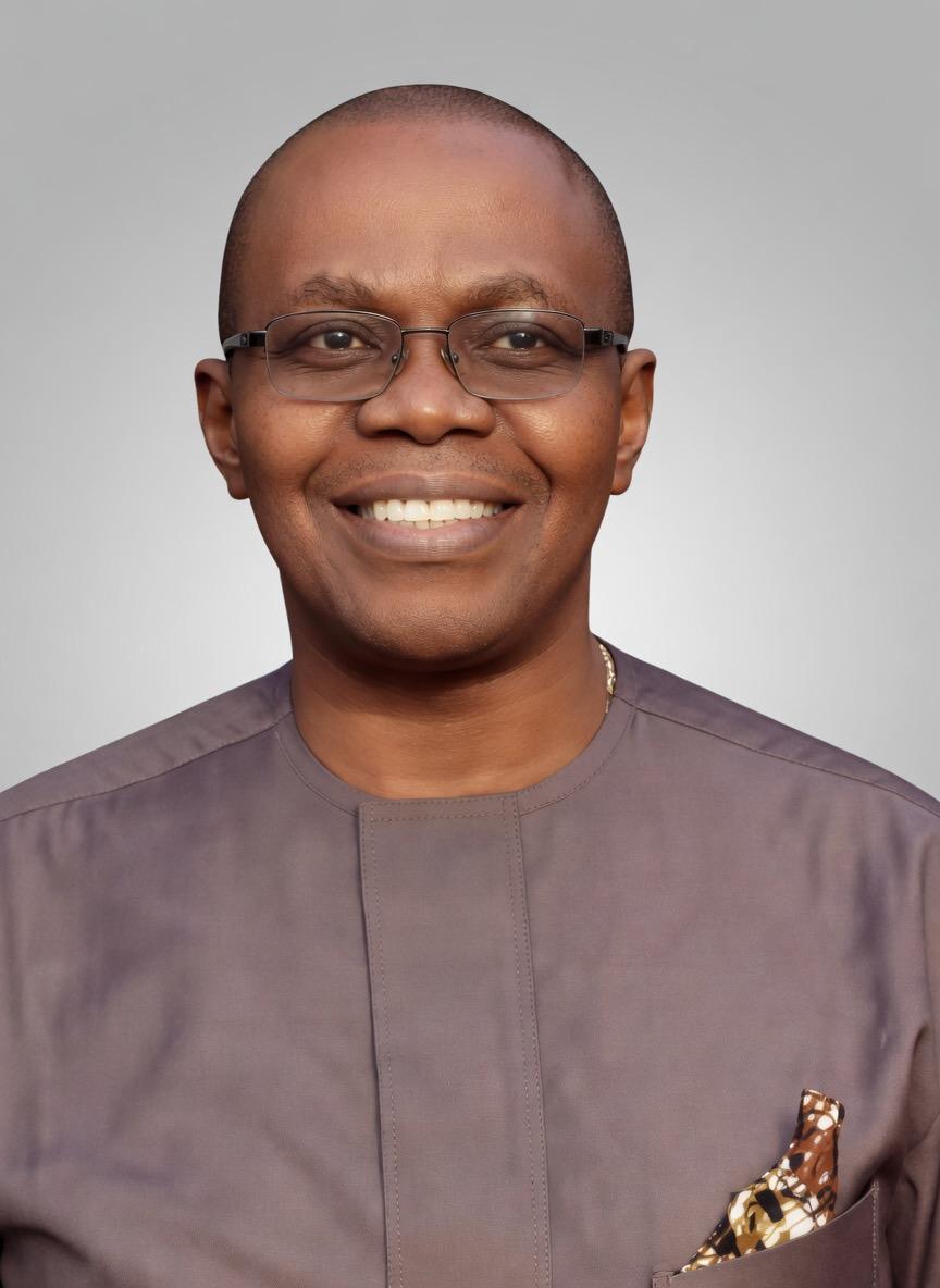 Portrait of an elder man — representing Chike Nwegbu